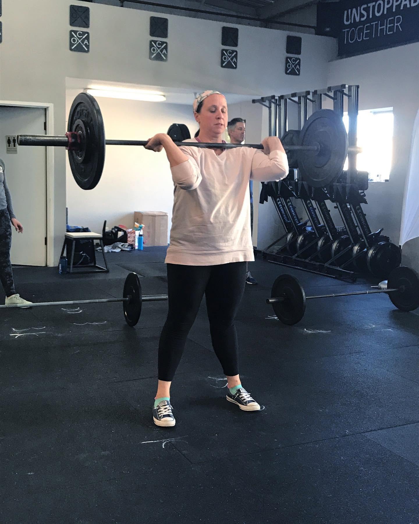 An adult member strength training at O-SEA CrossFit in San Clemente